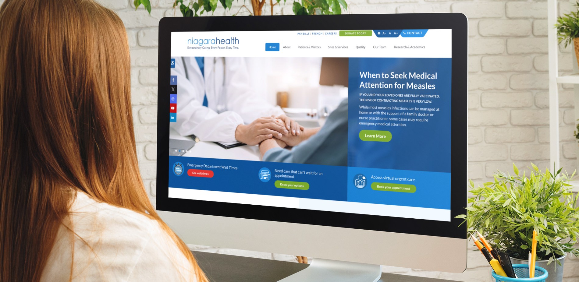 A computer screen shows the Niagara Health website, which is hosted on Tymbrel.
