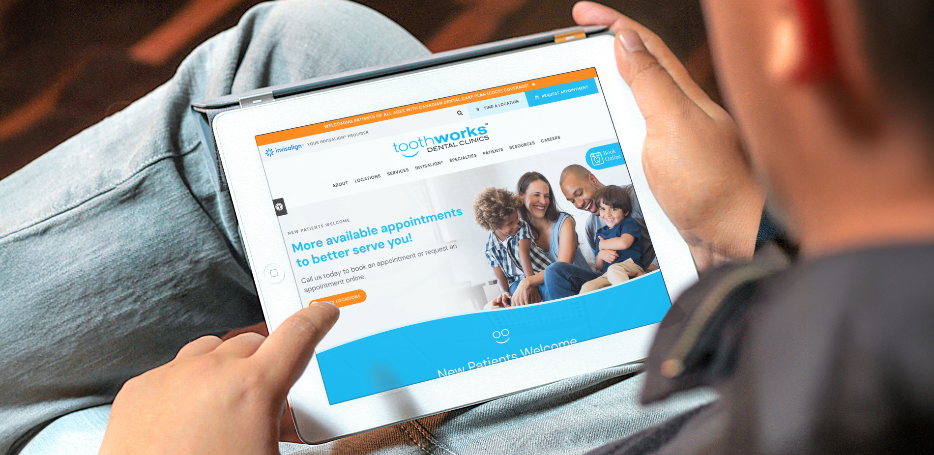 A tablet screen shows the toothworks website, which is hosted on Tymbrel.