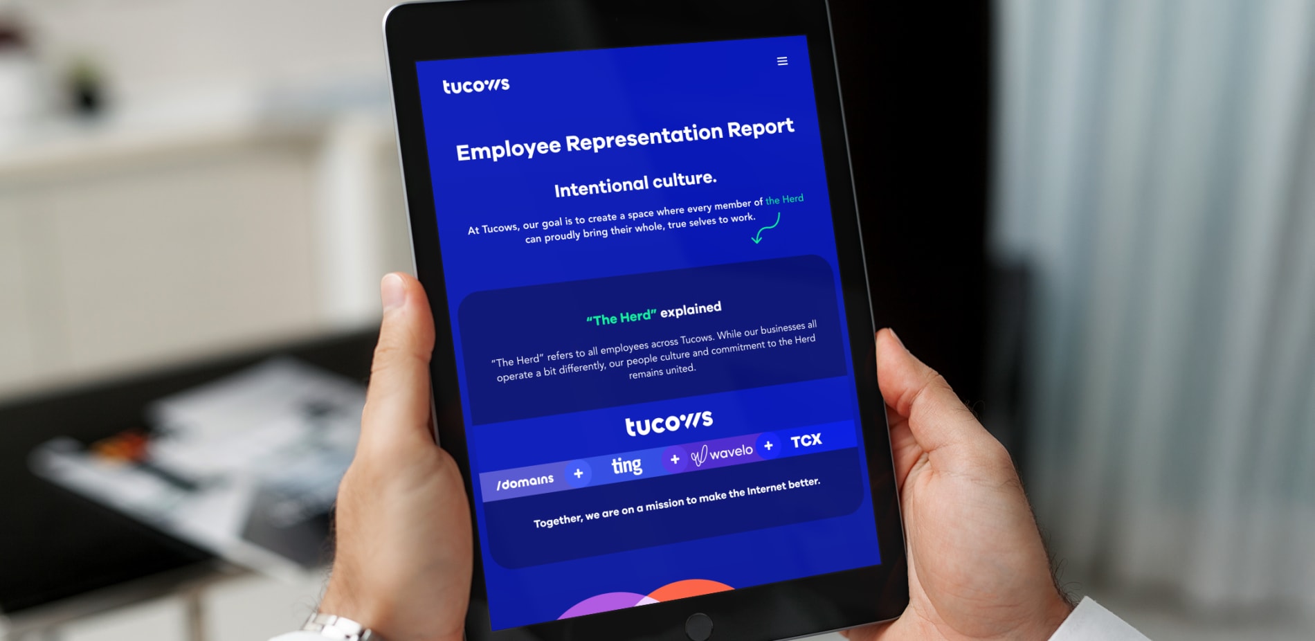 A tablet screen shows the tucows website, which is hosted on Tymbrel.